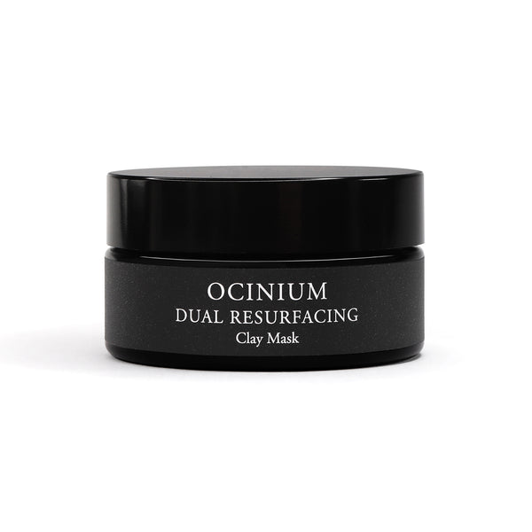 Black jar of Ocinium Dual Resurfacing Clay Mask on a white background