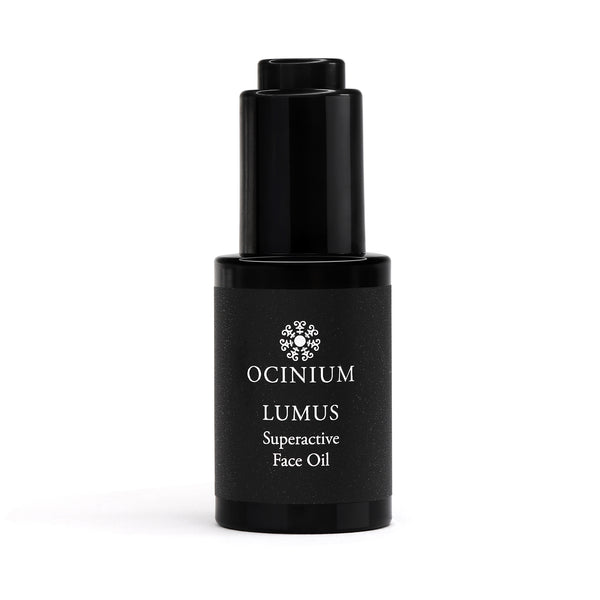 Black face oil bottle labeled 'Ocinium Lumus Superactive Face Oil' on a white background